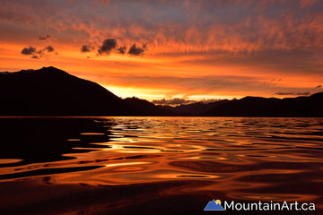 Slocan Lake sunset reflection, New denver, BC, Canada.