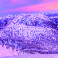 vivid painted winter alpenglow sunset in the selkirk mountains kaslo BC