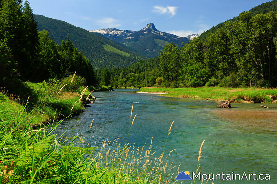 frog peak view along the slocan valley river rail trail in vallican, bc