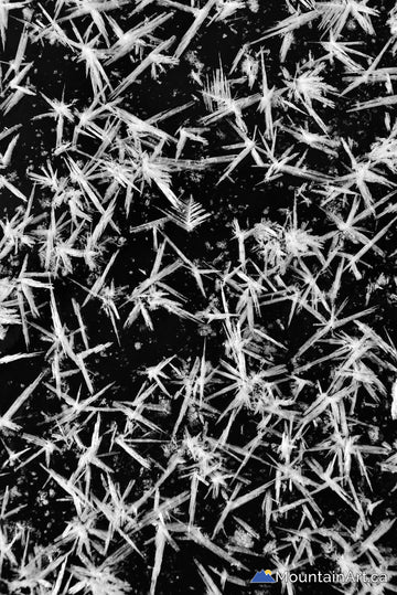 jagged ice crystals close-up in black and white