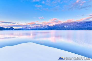 sunset alpenglow over kootenay lake winter ainsworth woodbury bc