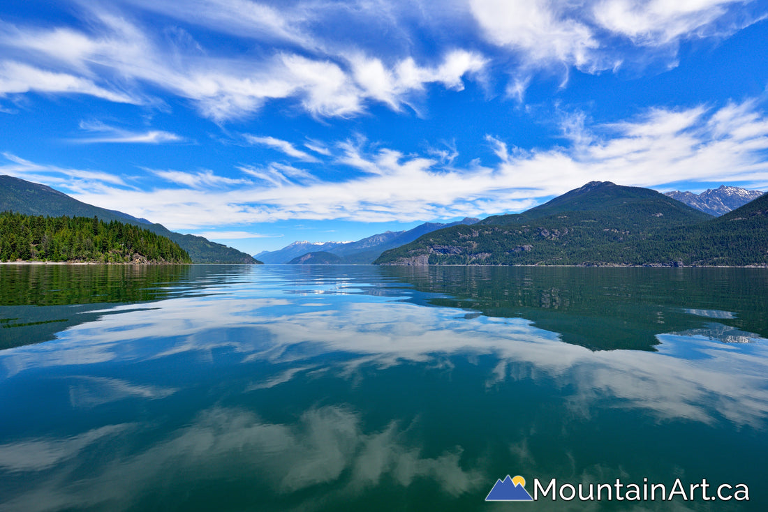 Kootenay Lake glassy waters and amazing clouds Kaslo, BC. 