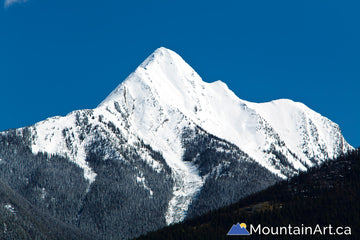 Mt Loki snow covered peak Purcell Mountains, Woodbury, BC. 