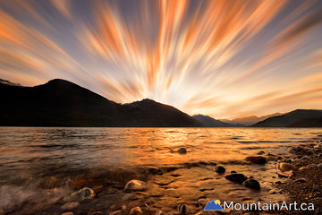 slocan lake divine sunset new denver bc streaking clouds