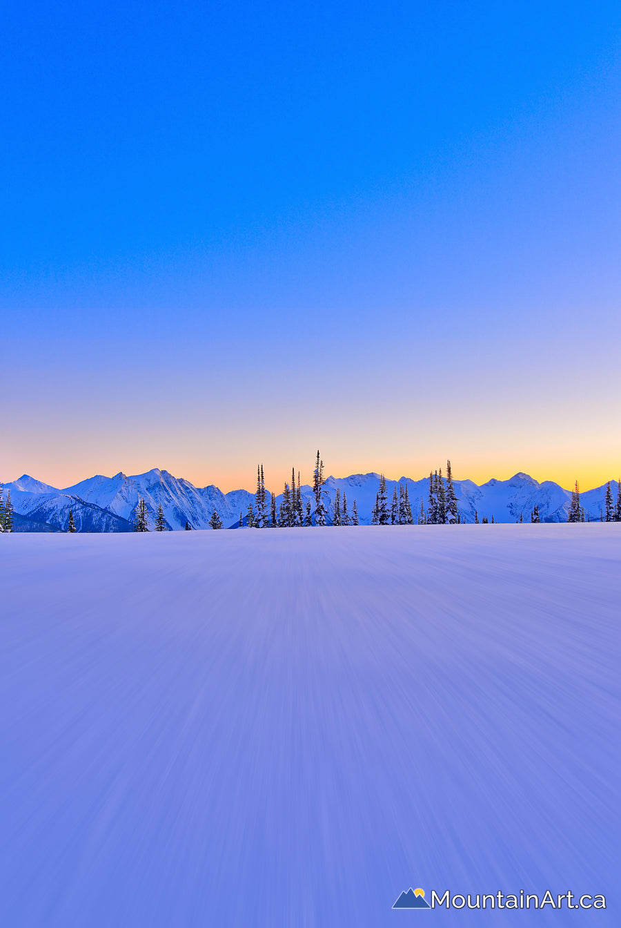 winter alpenglow selkirk mountains blurry snow goat range park bc