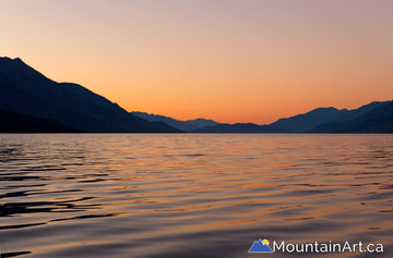 slocan lake colorful sunset from new denver bc canada