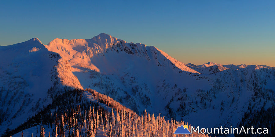 Ymir bowl sunset panorama with alpenglow whitewater ski Nelson BC